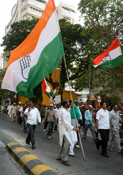 Congress workers holding party flags for victory possession (File Photo)