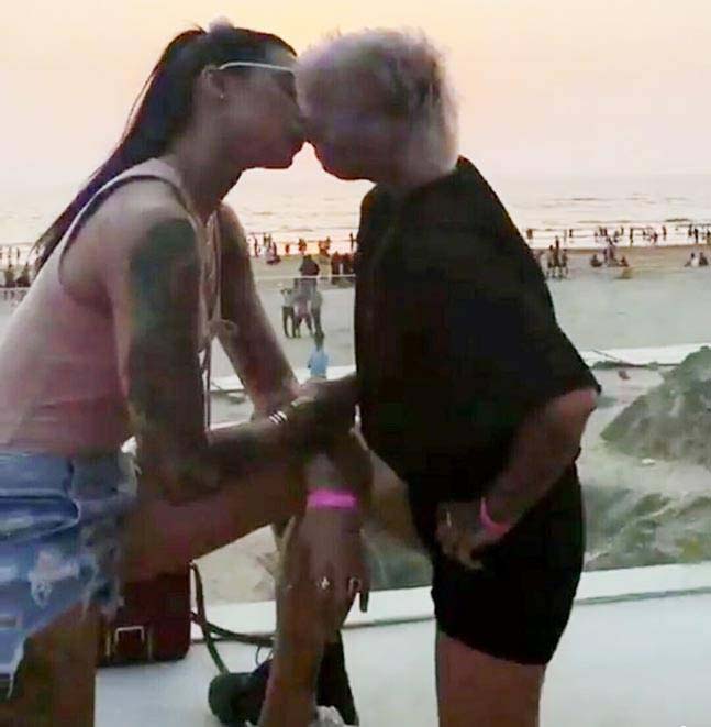 Bani Judge and Sapna Bhavnani are kissing each other