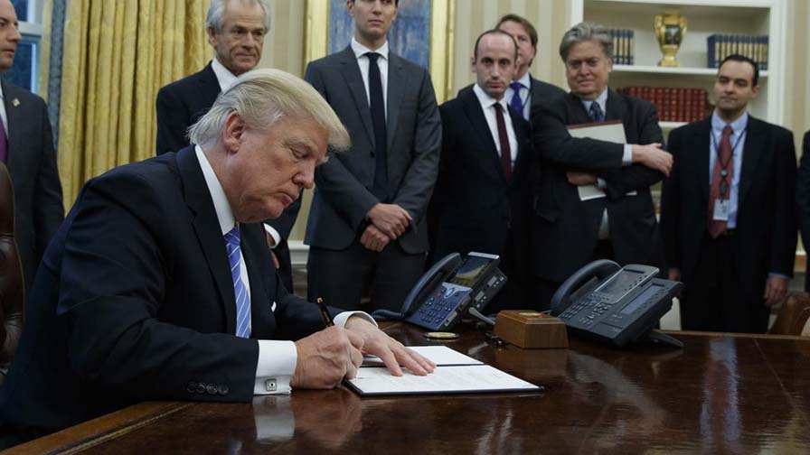 US President Donald Trump is signing two executive orders to initiate a comprehensive review of U.S. trade deficits. 
