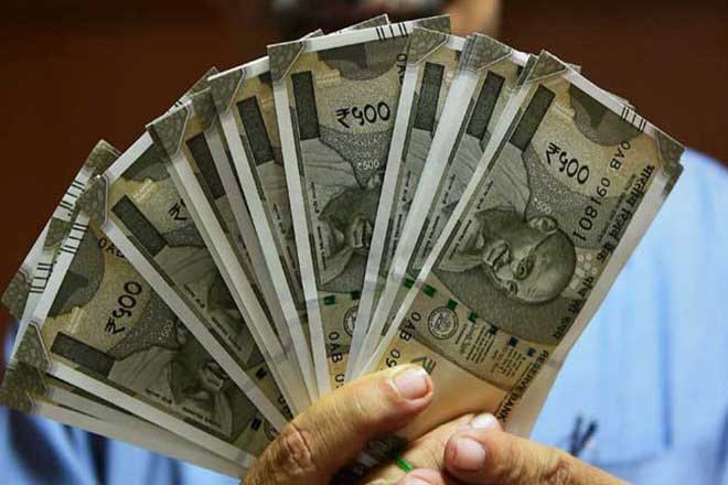 Rupee gains by 13 paise 