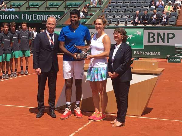 The seventh-seeded Indo-Canadian pair lift French Open Mixed Doubles' trophy