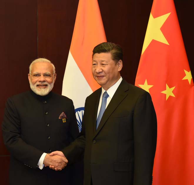 Prime Minister Narendra Modi shaking hands with Chinese President Xi Jinping 