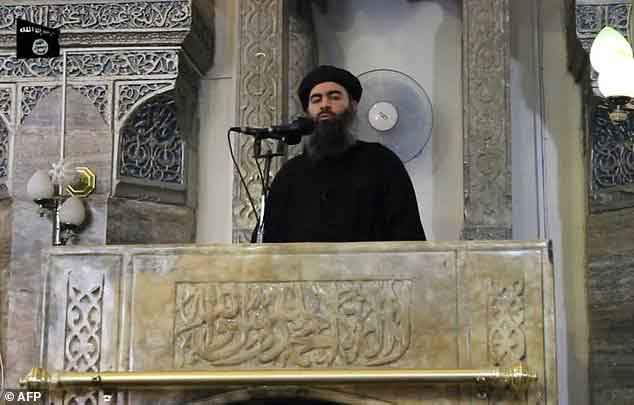 Abu Bakr al-Baghdadi addressing worshippers at a mosque in Mosul (file photo)