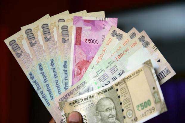 Rupee gains by 11 paise