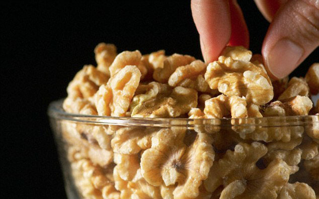 Daily serving of 57 grams or 1/2 cup of walnuts may keep your digestive system healthy (File Photo)
