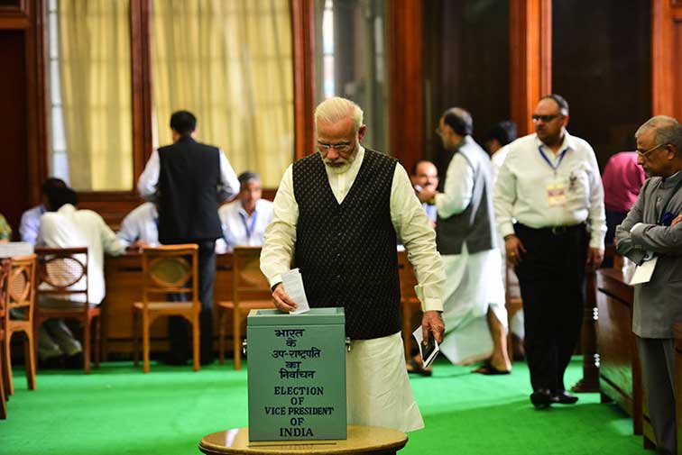 Prime Minister Narendra Modi casts his vote