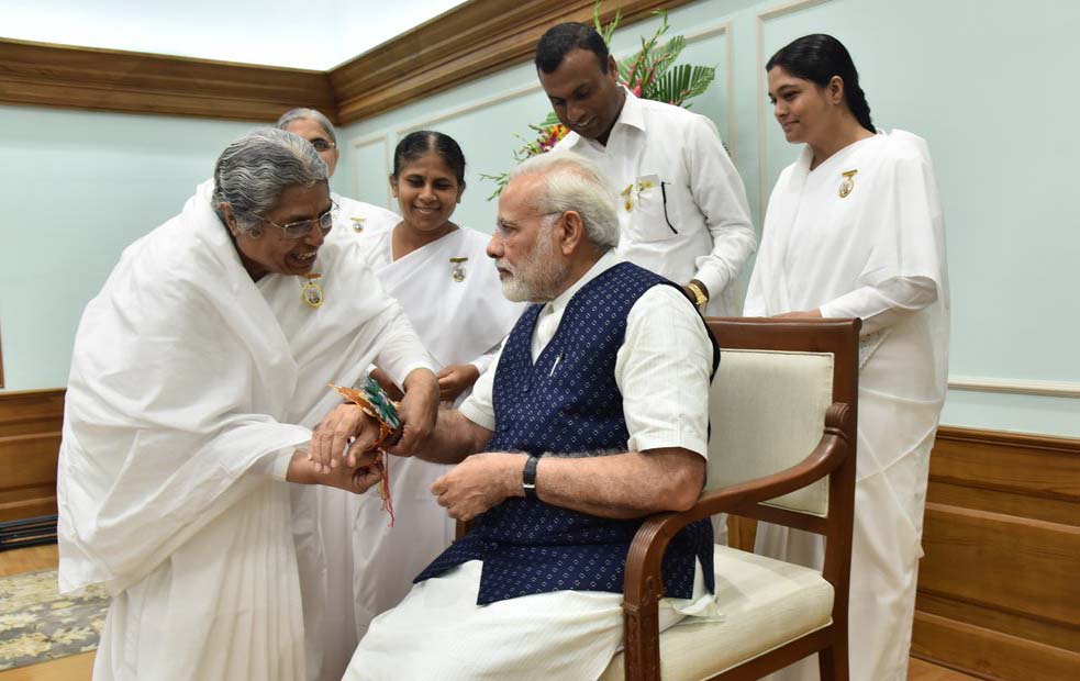 A widow is tie Rakhi to PM Modi 