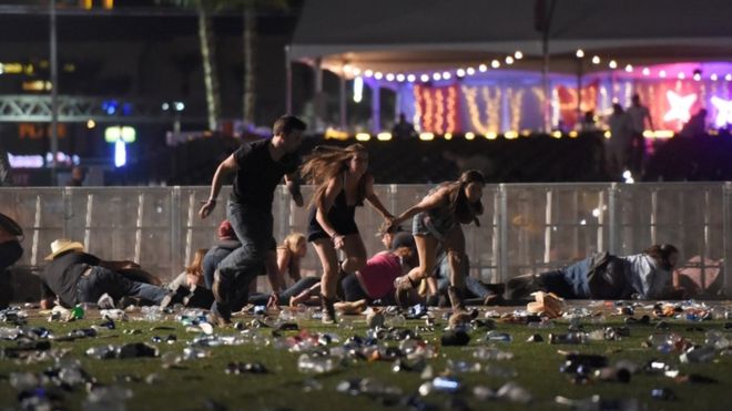 Hundreds of concert-goers fled the scene as automatic gunfire rang out