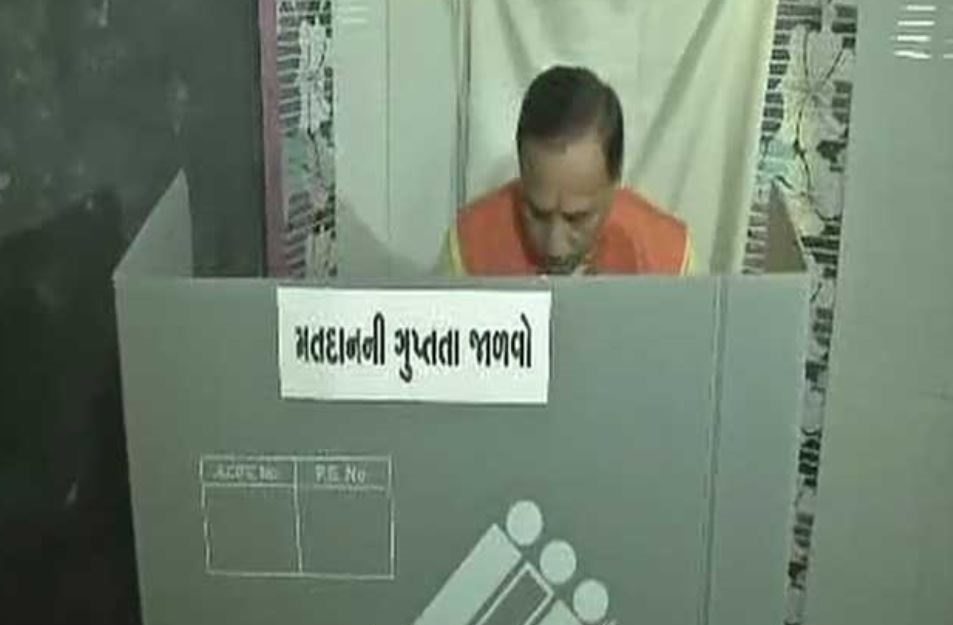 Gujarat CM Vijay Rupani casting his vote 