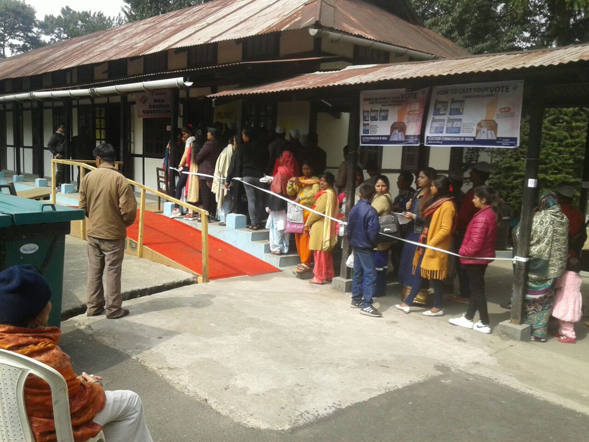 People standing in a queue to cast their votes  in Meghalaya