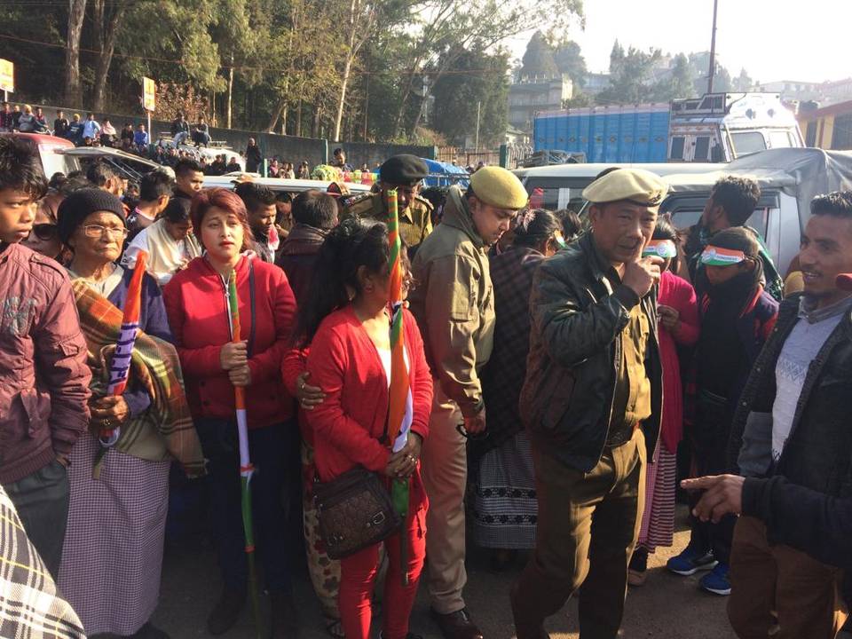 Congress supporters gather outside Shillong Polo Grounds in Meghalaya where counting is being held