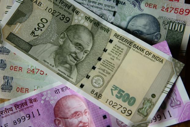 Rupee gains 9 paise