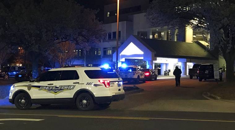 Police vehicles are shown outside UAB Highlands hospital following a shooting 