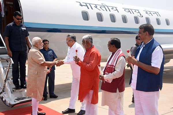 PM Modi recieves by Chhattisgarh CM Ramn Singh 