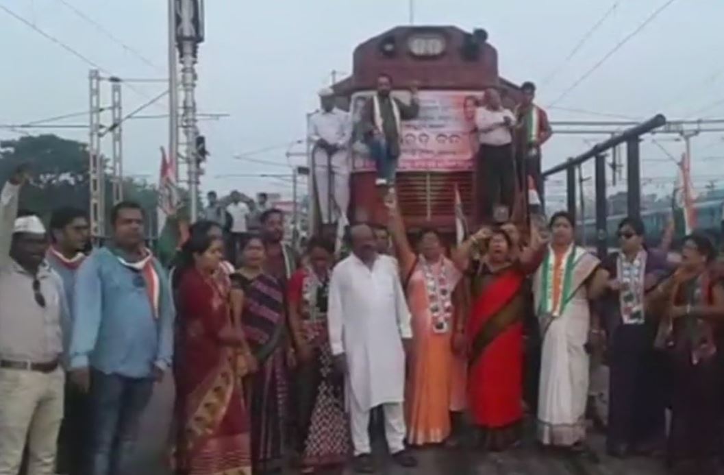 Congress workers block a train in Sambalpur as Bharath Bandh