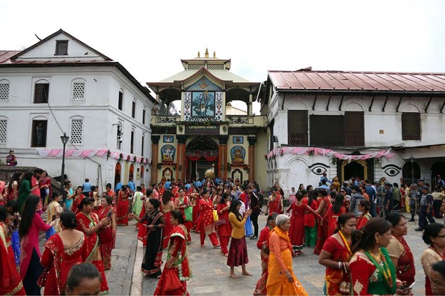 Women outside of the temple on the occasion of  Haritalika Teej