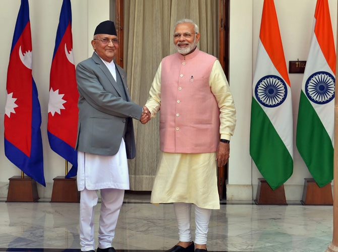 Nepalese Prime Minister Khadga Prasad Sharma with Narendra Modi