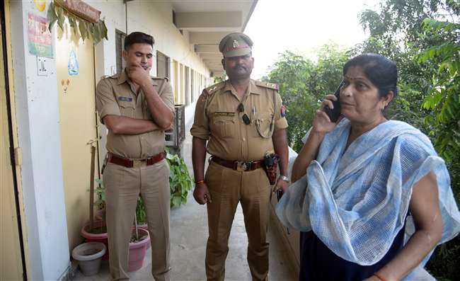 Abhijeet Yadav's mother with police
