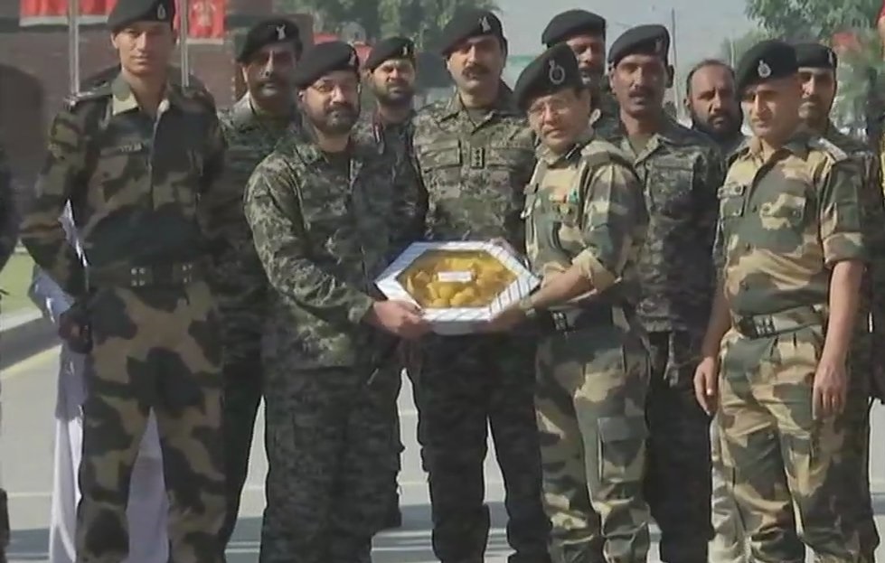 Troops at the Border Security Force and Pakistan Rangers exchange sweets