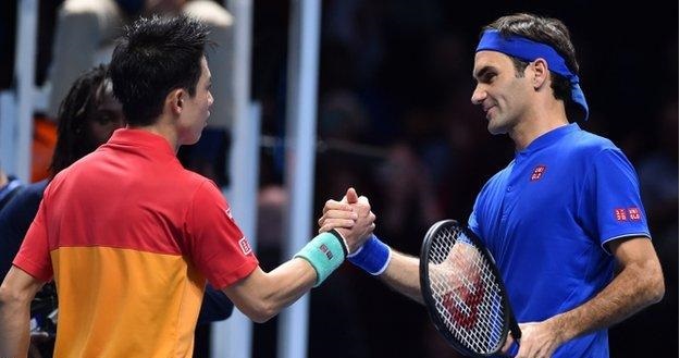Kei Nishikori and  Roger Federer