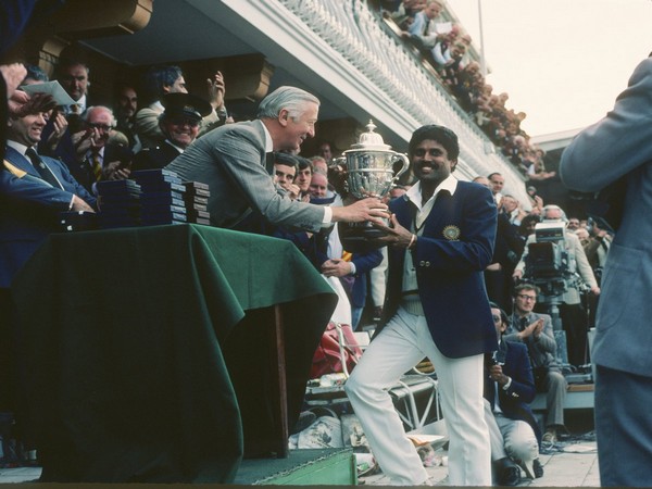 Indian captain Kapil Dev receiving the World Cup trophy at Lord's