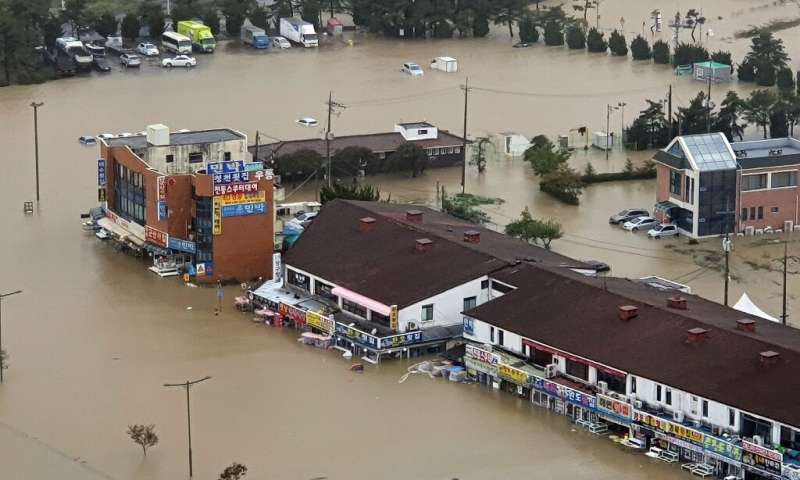 Typhoon Mitag left floods and landslides in its wake after it lashed South Korea