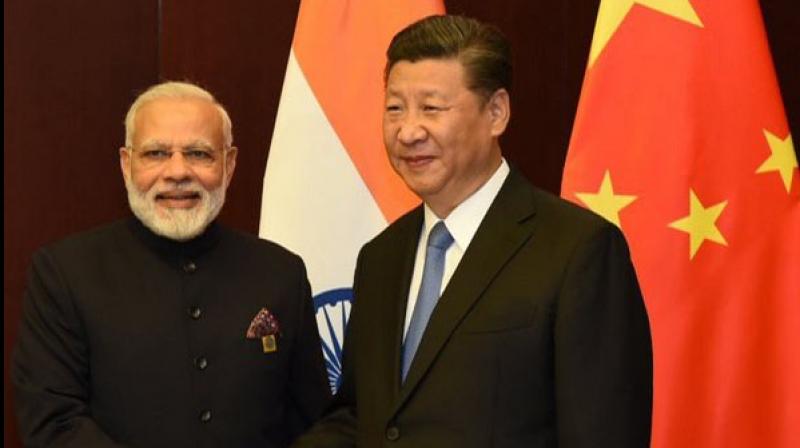 Chinese President Xi Jinping  and Prime Minister Narendra Modi
