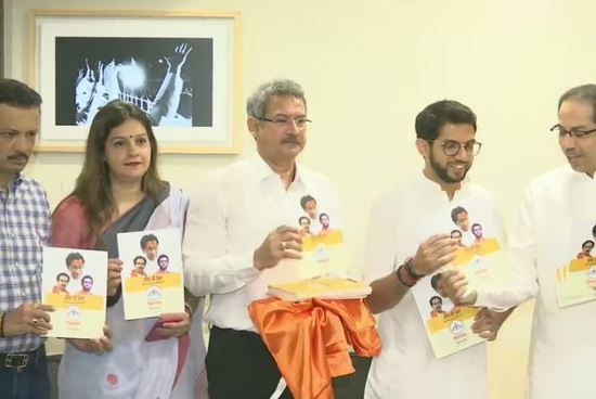 Shiv Sena chief Uddhav Thackeray and Aditya Thackeray at manifesto release in Mumbai on Saturday