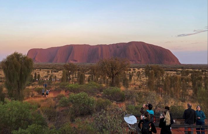 People view Uluru, formerly known as Ayers Rock