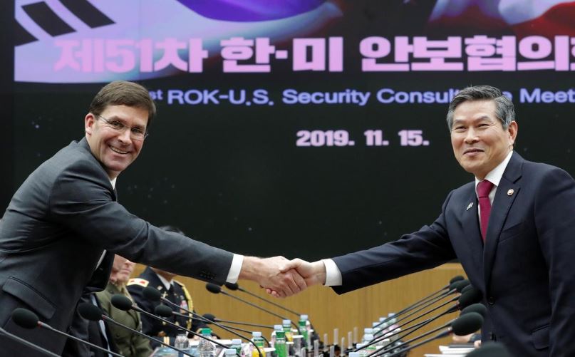 U.S. Defense Secretary Mark Esper and South Korean Defense Minister Jeong Kyeong-doo shake hands for the media prior to the 51st Security Consultative Meeting