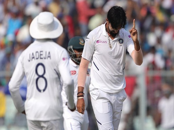 Pacer Ishant Sharma celebrates after taking a wicket against Bangladesh
