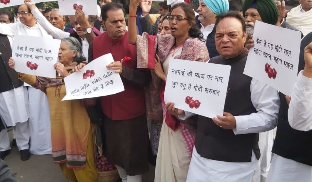 Congress leaders protest in Parliament premises over onion prices.