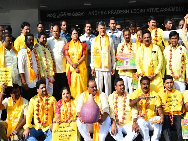TDP chief N Chandrababu Naidu with other party members protesting against onion price hike in Amravati in Andhra Pradesh on Monday