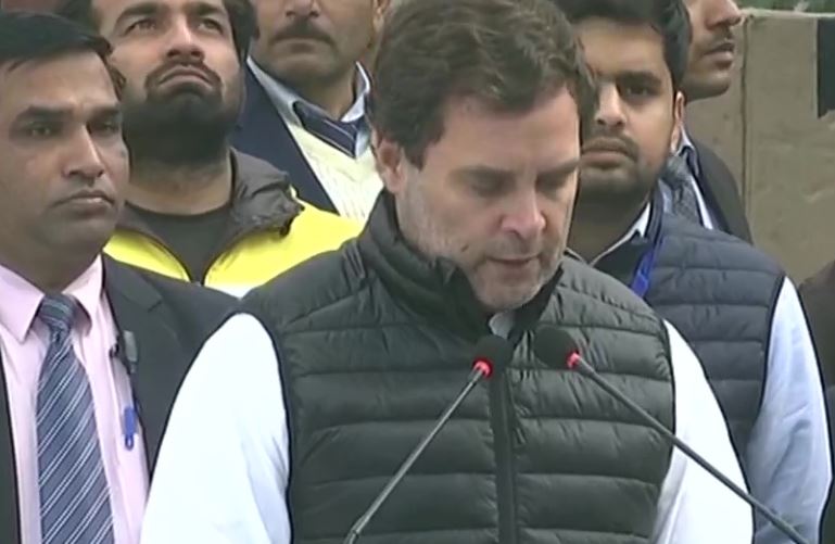 Congress leaders Rahul Gandhi read Preamble of Constitution during a protest against CAA and NRC at Rajghat