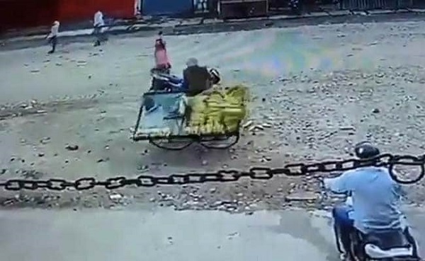 policeman damages maize cart