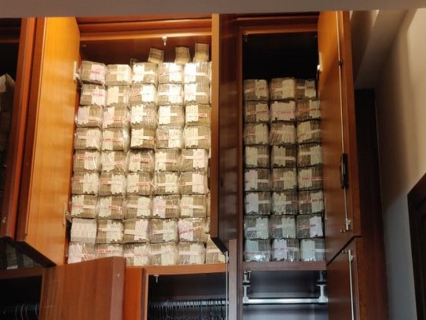 A visual of the cash recovered during the raids