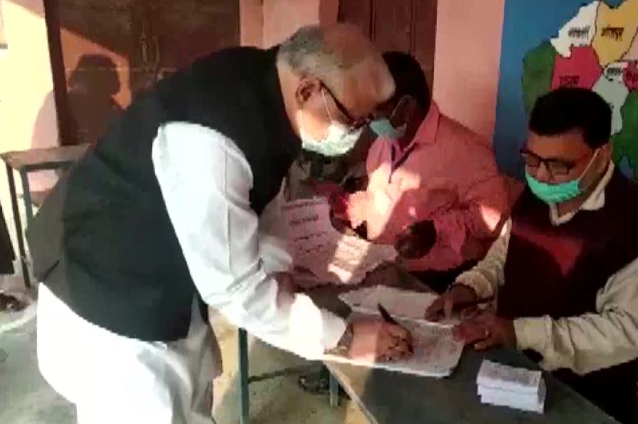 Rajya Sabha MP Ahmad Ashfaque Karim casts his vote at a polling station in Katihar
