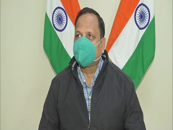 Delhi Health Minister Satyendar Jain talking to media on Thursday