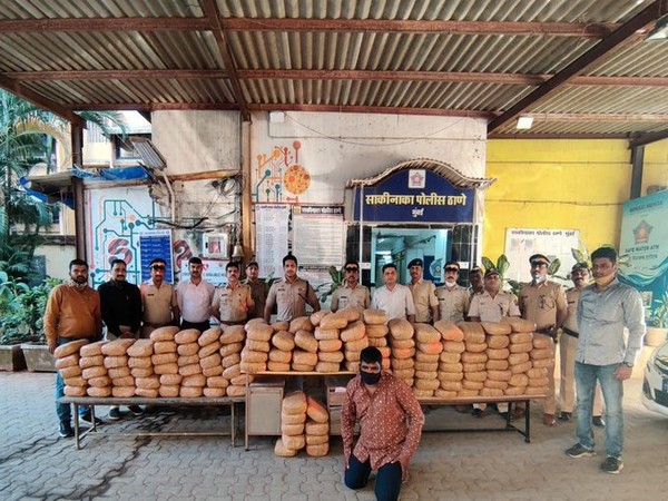 Visual of Mumbai Police officials along with the recovered ganja.
