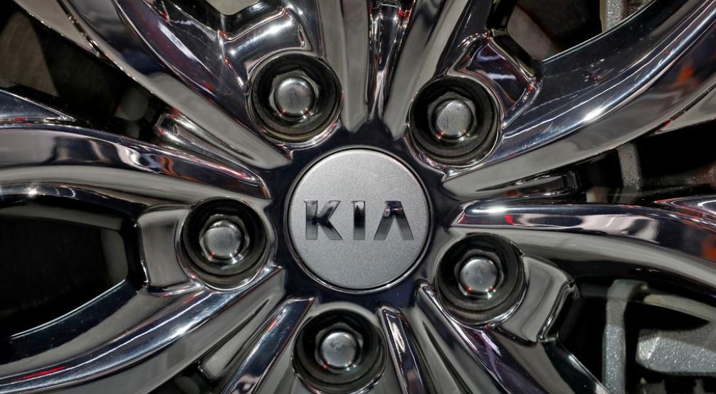 The logo of Kia Motors is seen on a wheel of its Carnival car at the India Auto Expo 2020