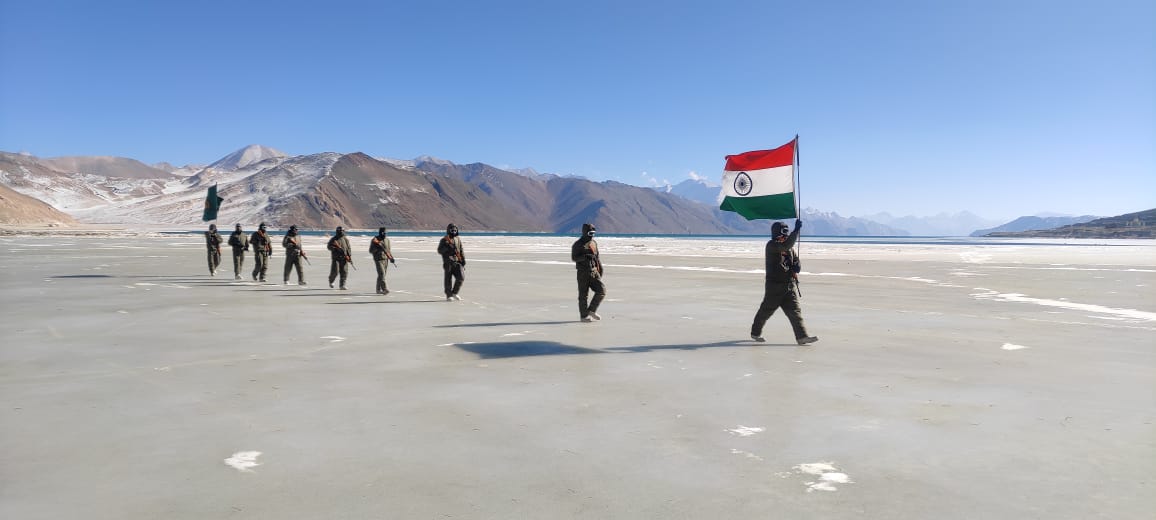 ITBP jawans march with national flag on frozen water body in Ladakh