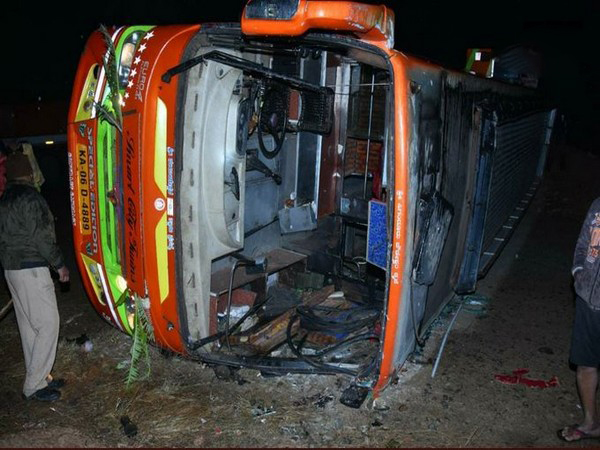 Image of the bus turned turtle near Sira-Bukkapatna state highway