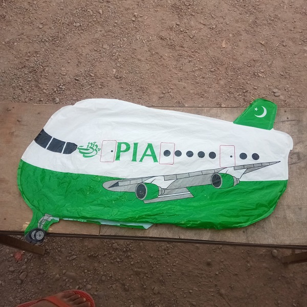'PIA' marked aeroplane-shaped balloon