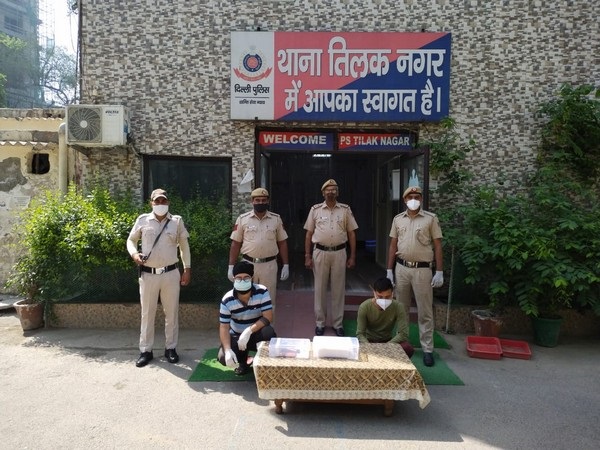 Delhi Police with the two accused
