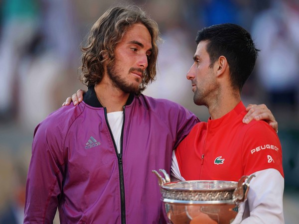 Stefanos Tsitsipas and Novak Djokovic after the Roland Garros Final. (Photo: Nicolas Gouhier/FFT)