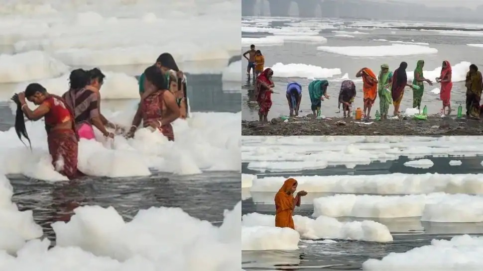 Devotees took a dip in the Yamuna river that had a thick layer of toxic foam near Kalindi Kunj