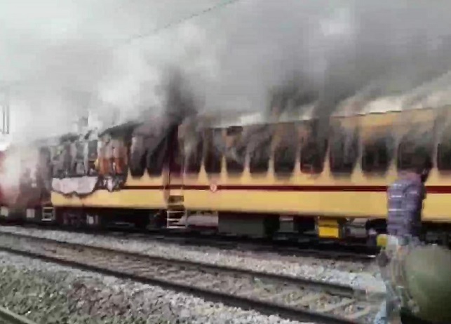 Train burnt by the protestors in Gaya, Bihar