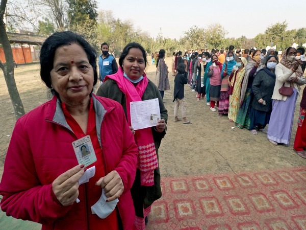 People standing line to caste their vote