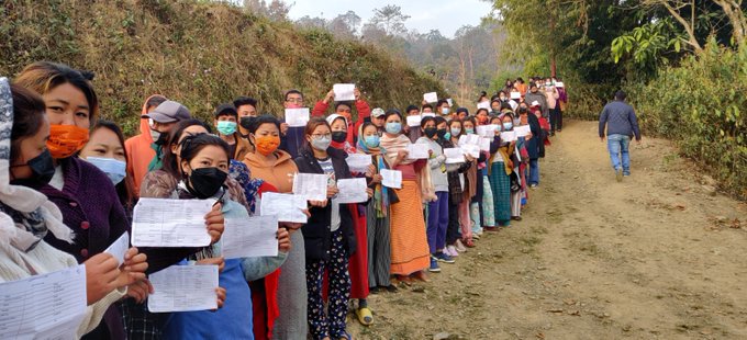 People standing line to caste their vote