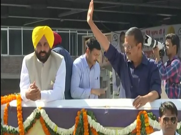 AAP national convenor Arvind Kejriwal with Punjab CM-designate Bhagwant Mann hold a roadshow